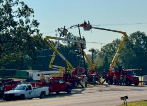 TVEPA linemen installing new pole for electric grid and fiber in Water Valley